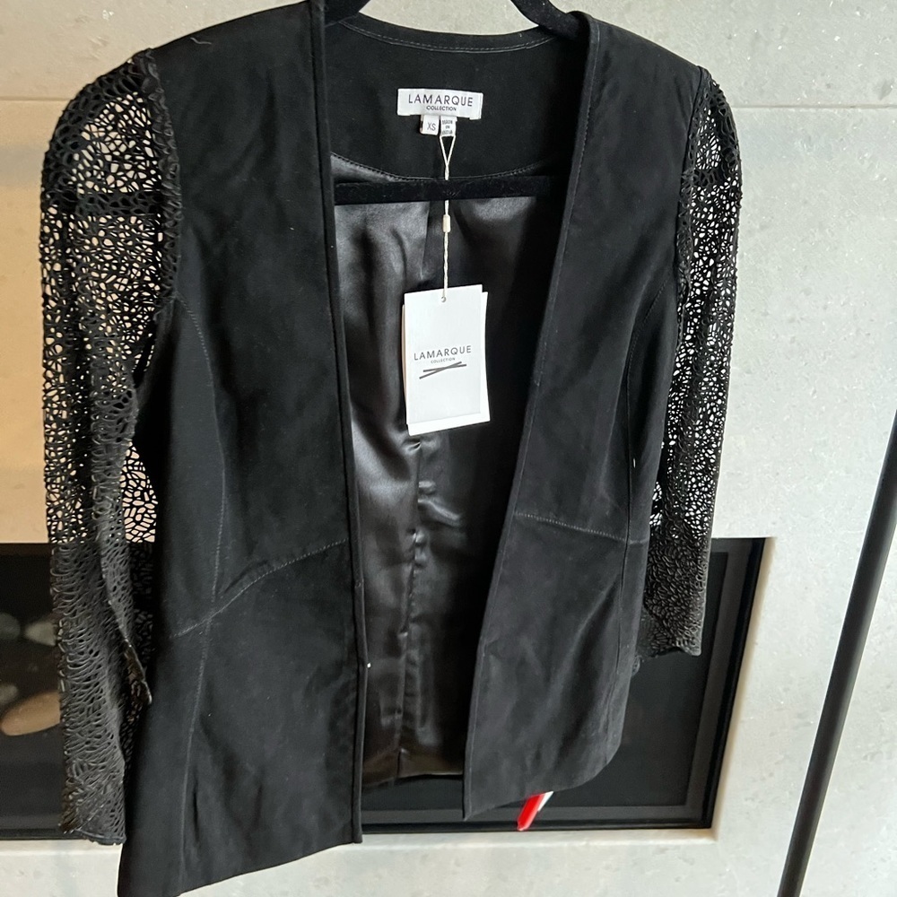 NWT, Black suede, nice detail through your the cape.